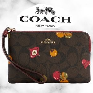 Coach  Corner Wristlet  With Ornament Print